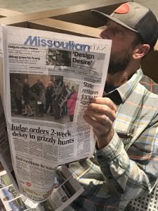 Reading the coverage of the grizzly hunt injunction after oral argument the previous day (August 21, 2018). Photo: John Mellgren.